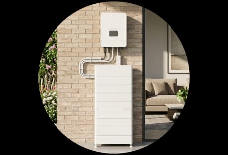 Solar battery system installed on brick wall of NSW home.