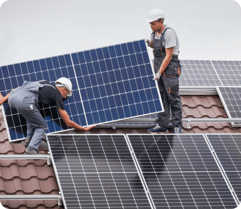 solar installer is installing solar panel system